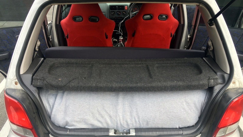 Illustration for article titled How To Turn Your Hatchback Into A Mini-Camper For Cheap Road Trips